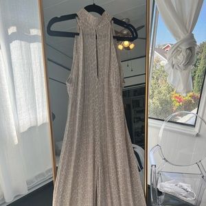 Zimmermann giraffe print halter jump suit. Perfect condition. Size 4/6